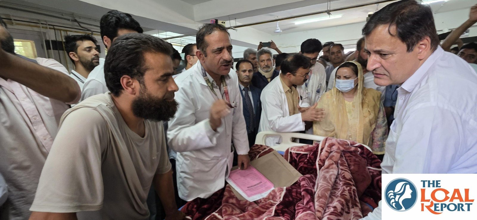 Sakeena iToo, Javid Dar Travel from GMC Handwara, inquire about the good of road accident victims