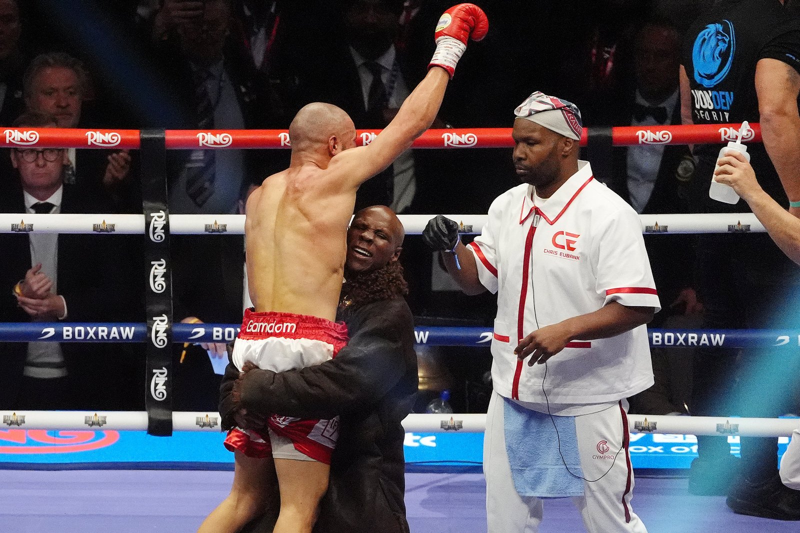 After his victory over Ben in April, Urbank Junior celebrates with his father (Bradley Coliere/PA)