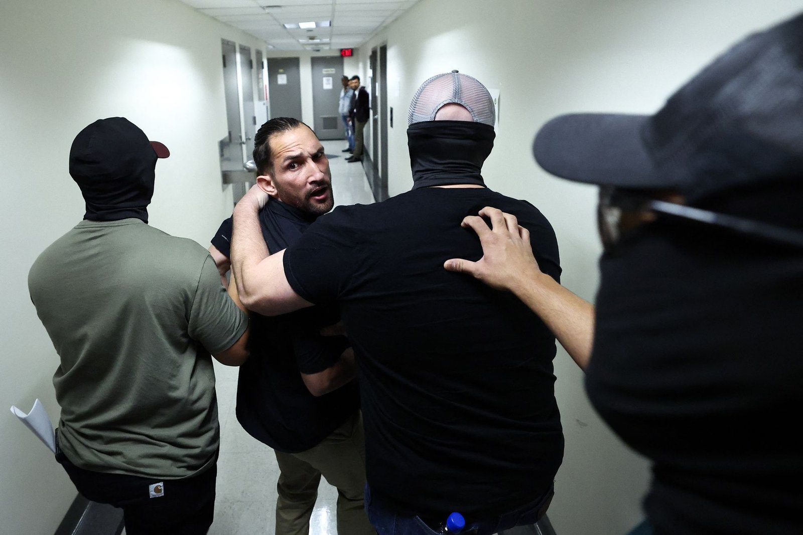 A person is detained by federal agents on 1 October after hearing in an immigration court in New York City, where the courthouse hallway for the exile schemes of the Trump administration has emerged as an important flashpoint, the authorities have prepared to arrest the immigrants after leaving their hearing.