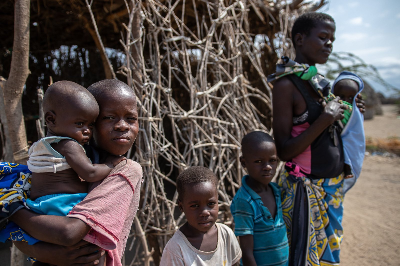 Dina portrayed here with her family, says that NGOs like the World Food Program that supported the family in Turkana are no longer coming