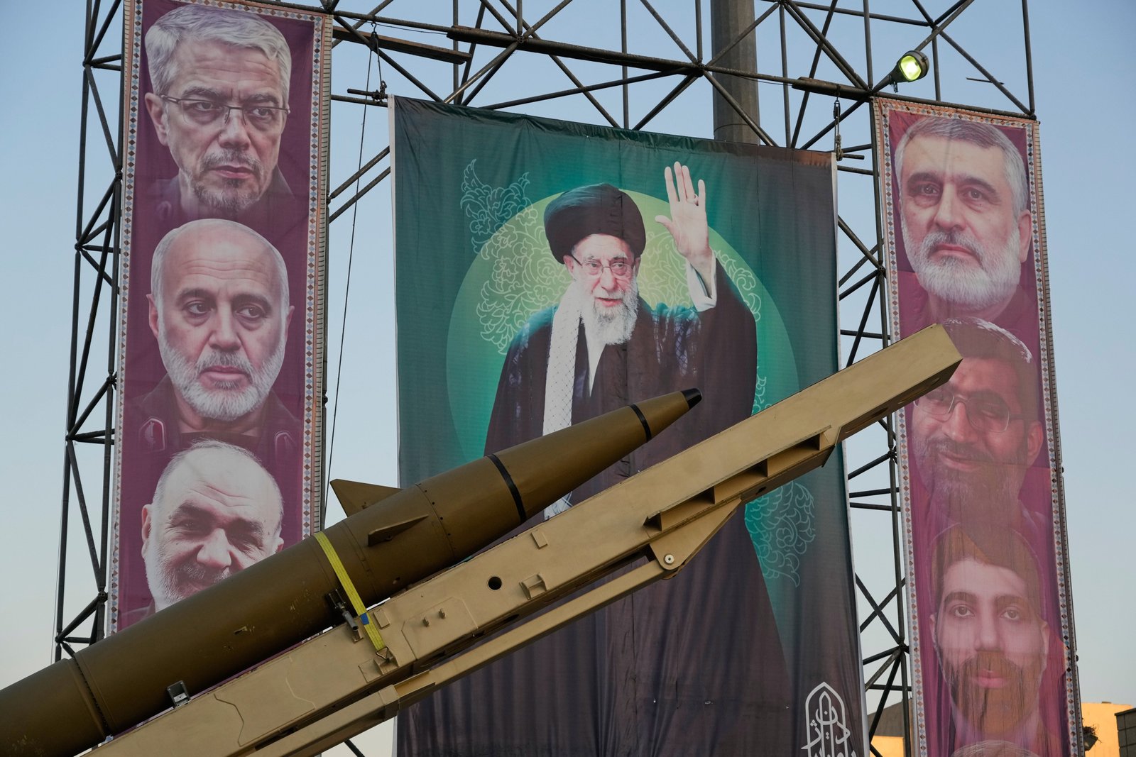 A domestic-built missile 'Khyber-Buster' and banner Irani supreme leader Ayatollah Ali Khamenei shows pictures of commanders of the Center and the late armed forces, who were killed in an Israeli strike in June