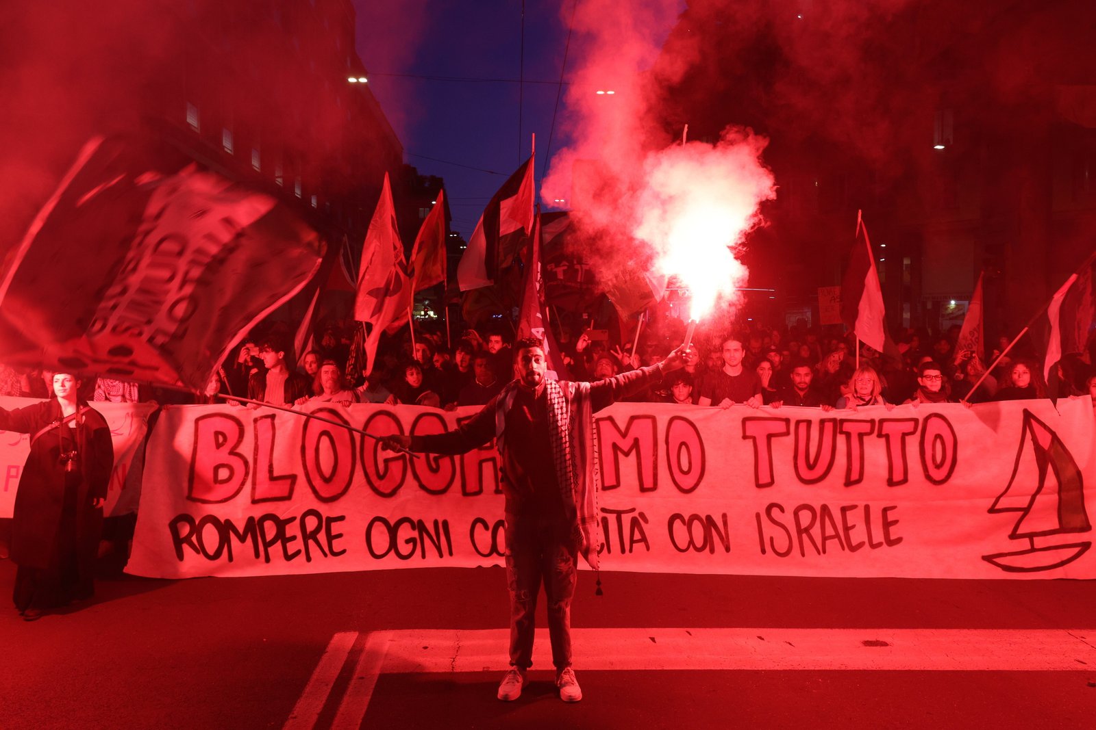 Protesters rally in Bologna, Italy against the custody of aid ships