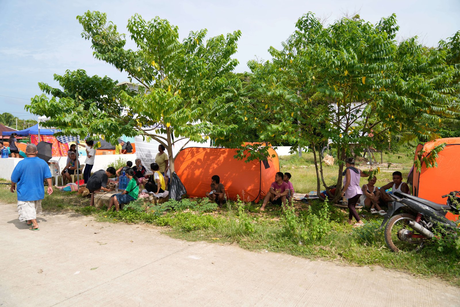 San Remegio, survived by Tuesday's earthquake, lives in open places in Sebu province