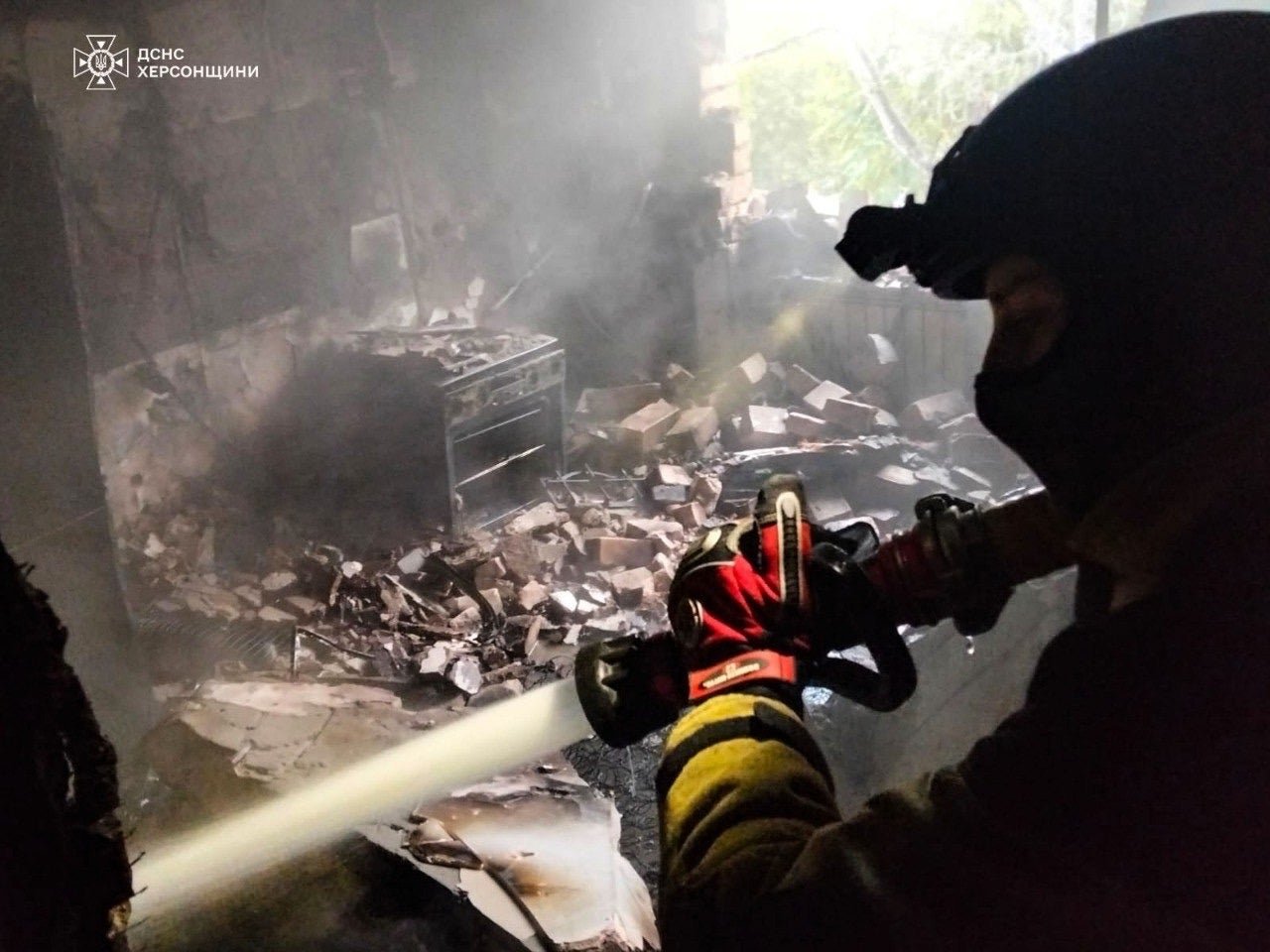 A fire fighter in a residential house