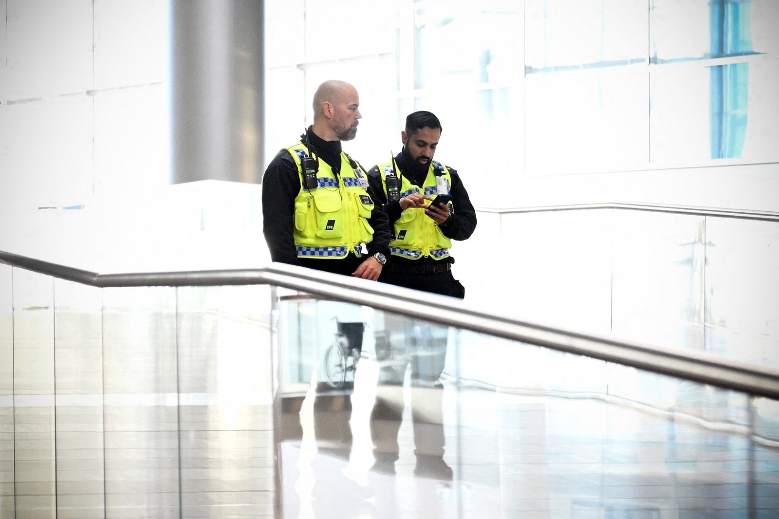 Security officers at Copenhagen Airport, where dozens of flights were diverted or canceled last week due to an intrusion of unknown drones