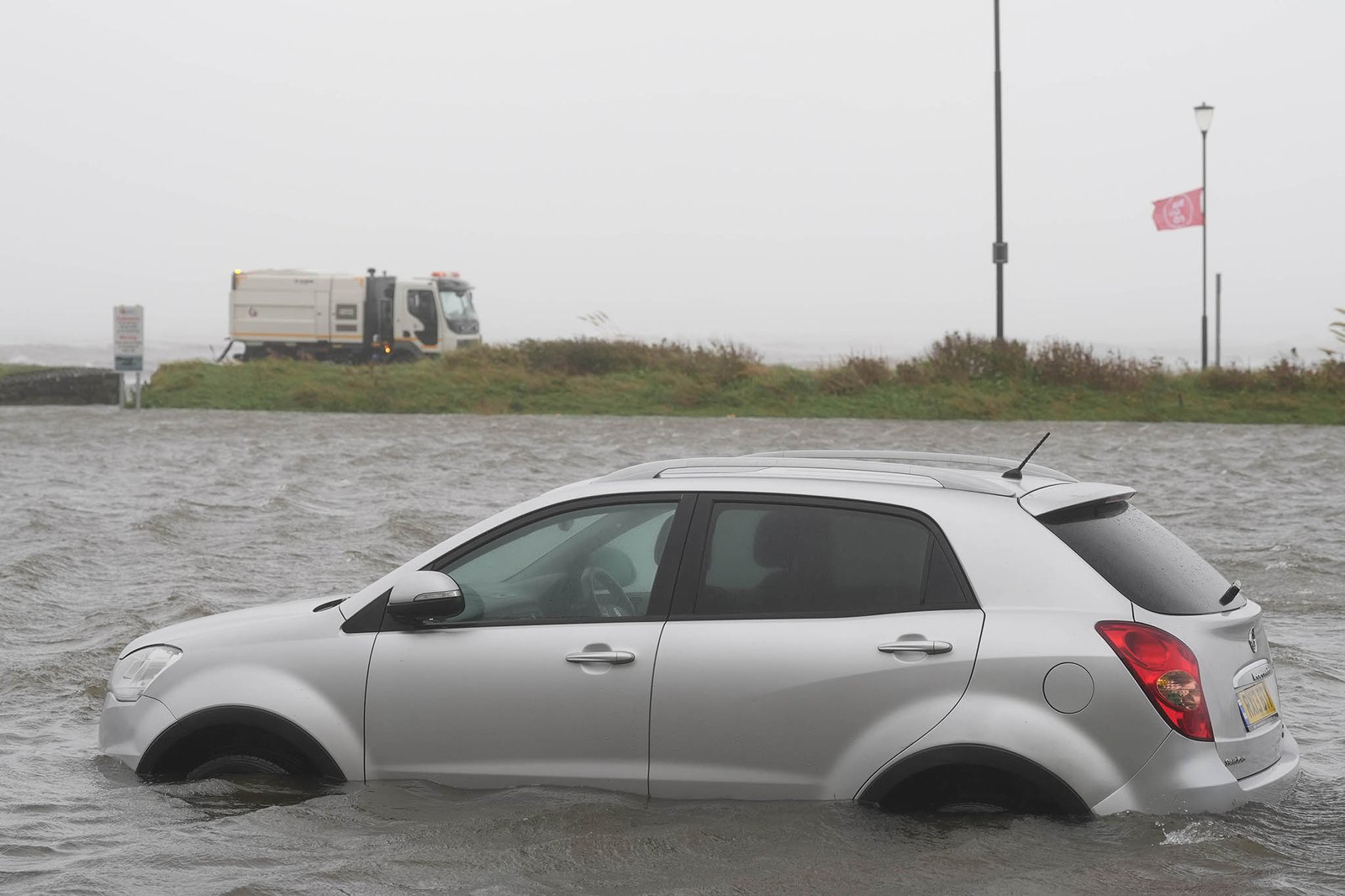 A car in a flooded carpark in Gaulway