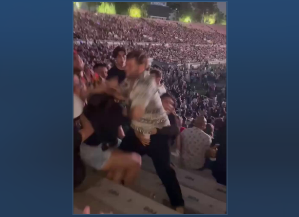 A man, who has identified the police as Julio Caesar Lopez Zawala, attacks Shelby Lynn Eleston during a concert in Rose Bowl on August 16, 2025. A video showed a video that killing Ellston several times, made him unconscious and pulled out of her blood and left her and left her.