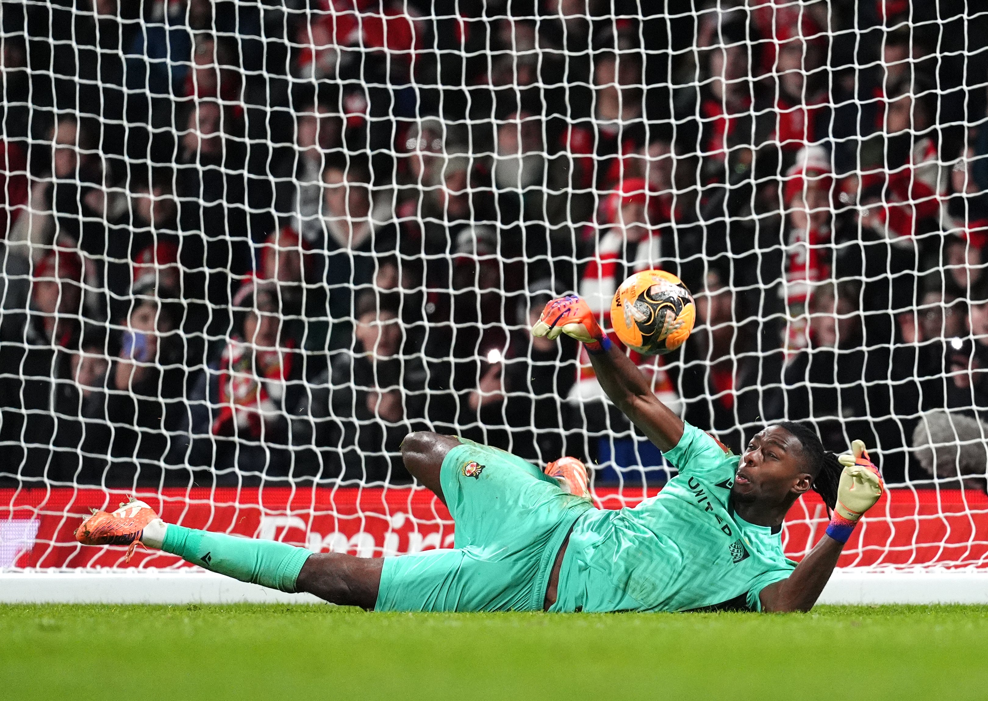 Okonkwo saved the decisive penalty in the shootout to stop Omari Hutchinson's shot