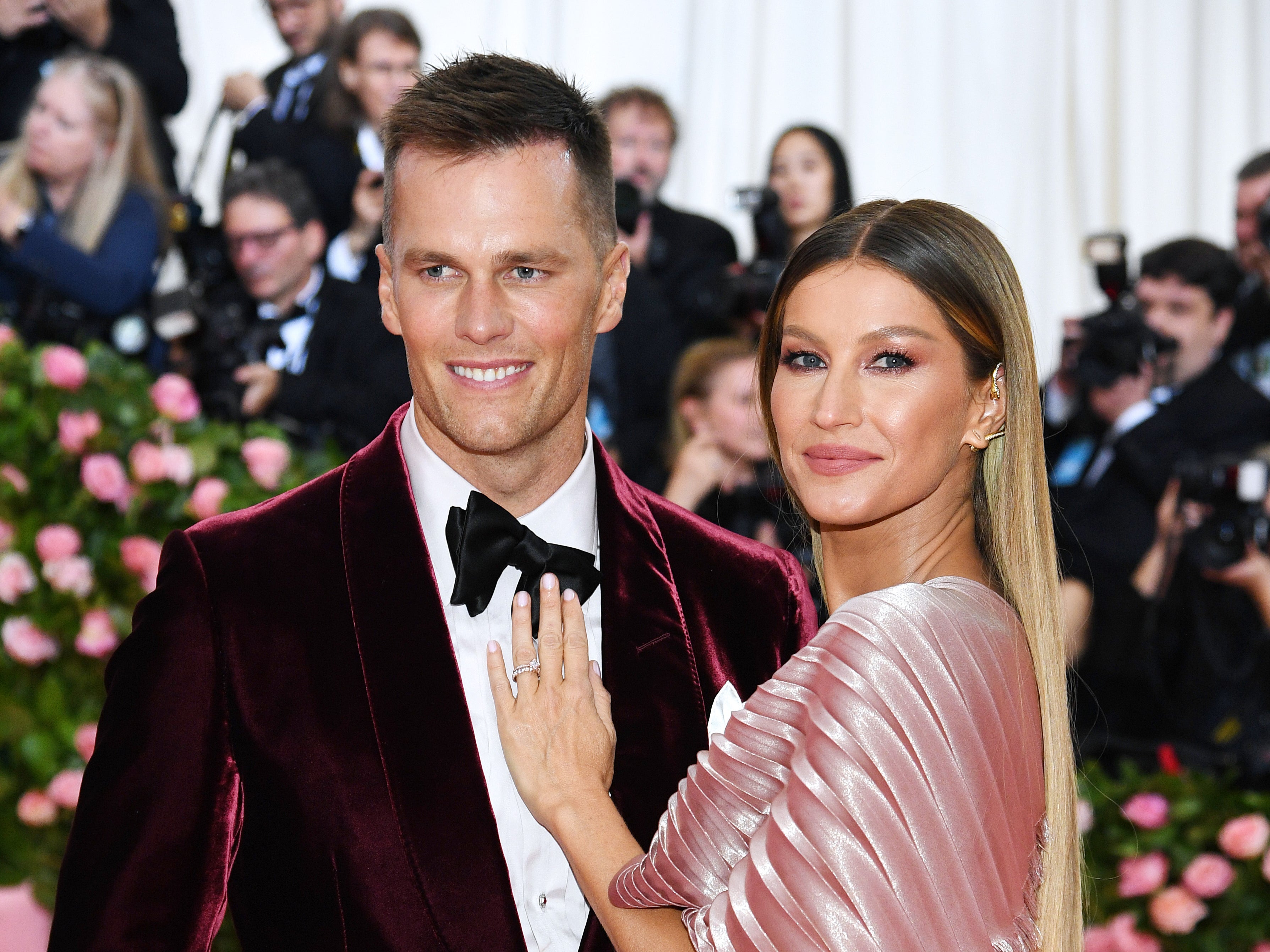 Tom Brady and Gisele Bundchen posing together at the 2019 Met Gala in New York City. Brady and Bundchen divorced in 2022 after 13 years of marriage. Brady entered the fashion industry in 2022 with his Brady Brand Clothing company