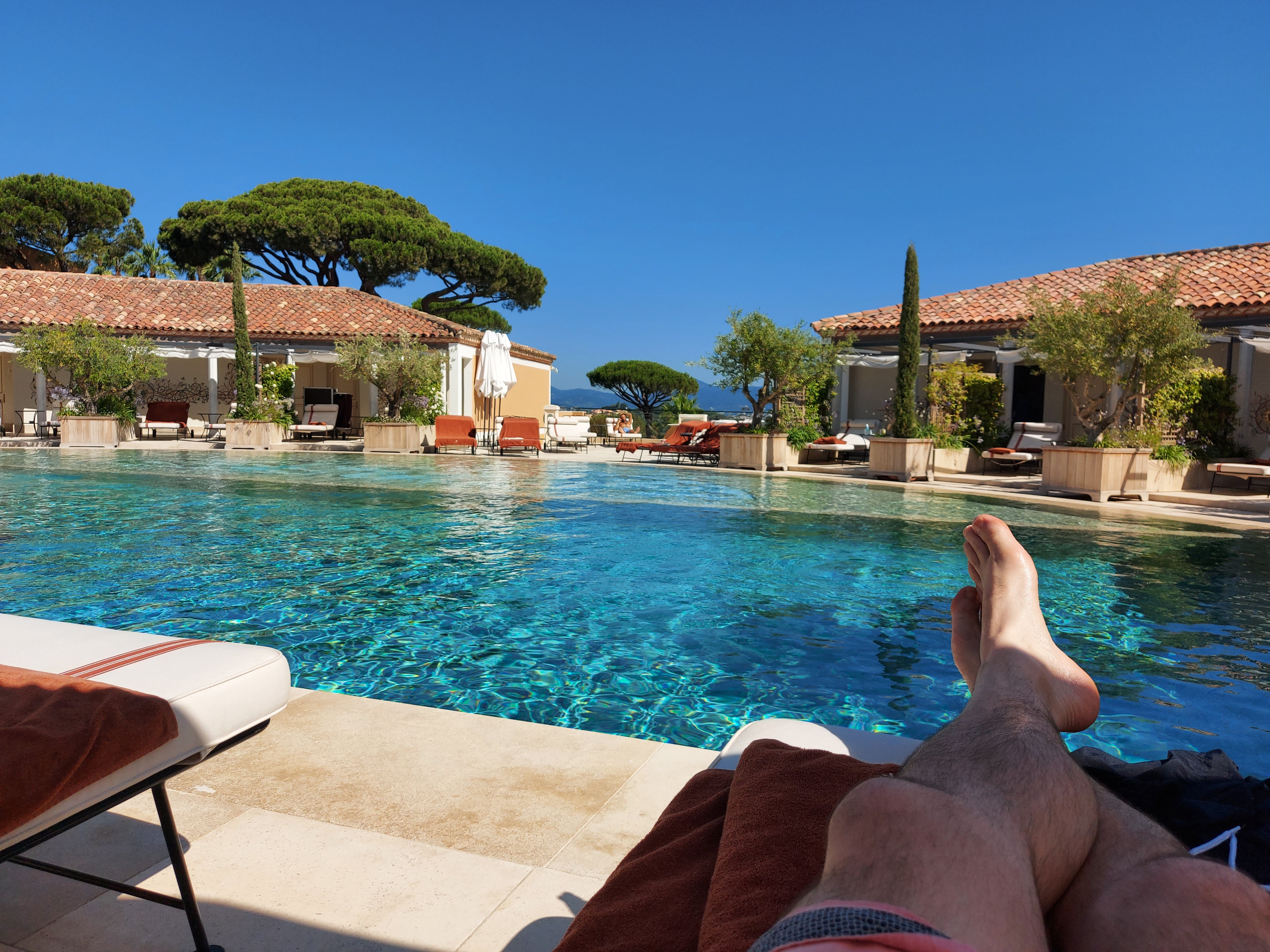 Ted spends most of his time relaxing by the main pool at Château de la Messardière