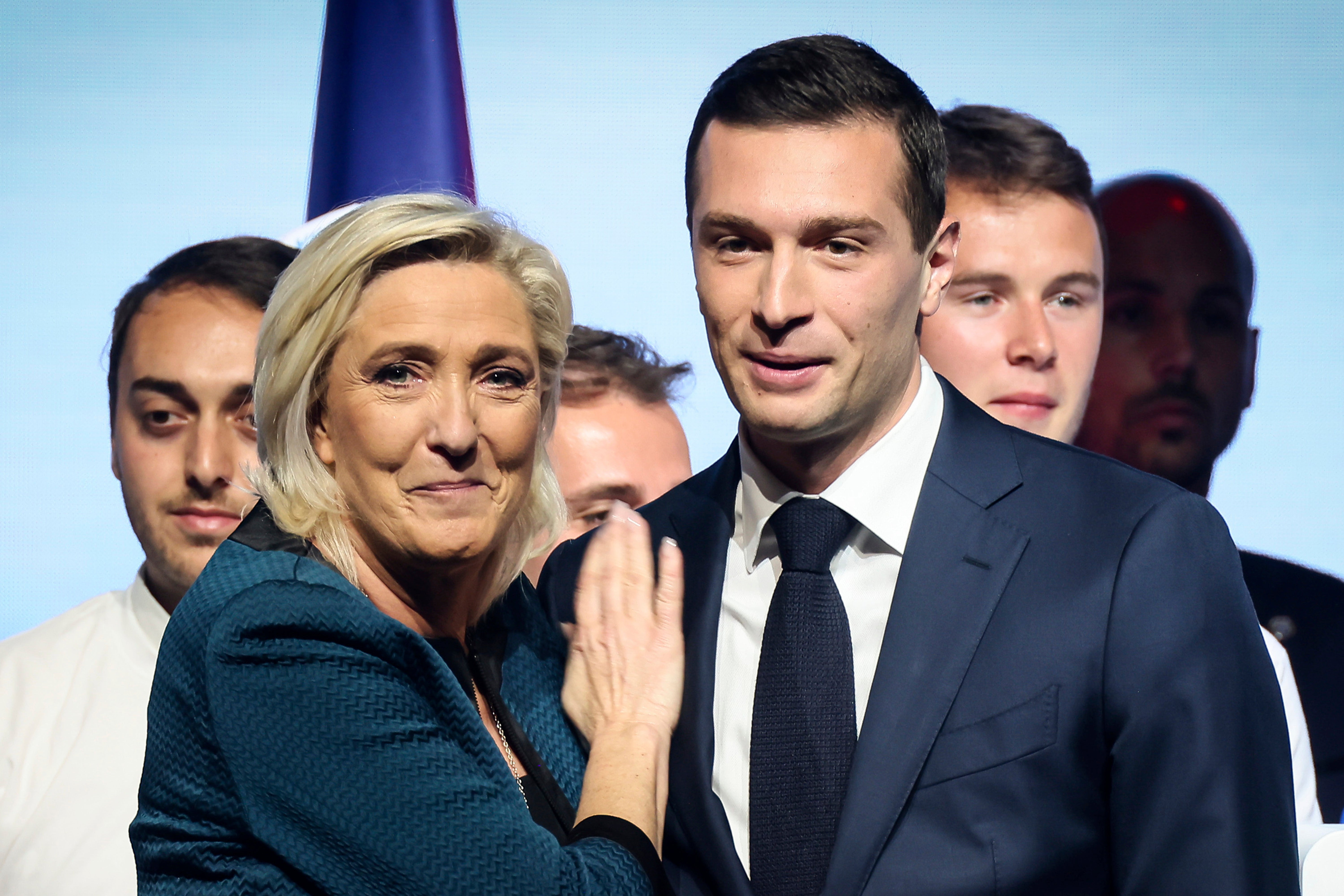 Heir apparent: National Rally party leader Jordan Bardella (front right) with Le Pen, who could succeed her in the race against Macron