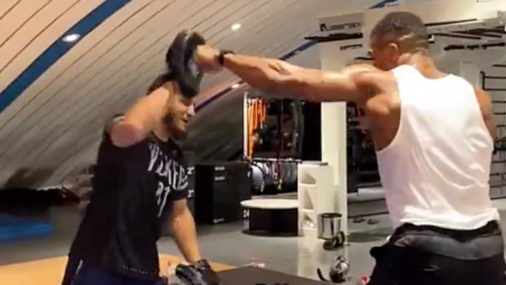 Anthony Joshua returns to gym after crash that killed two friends