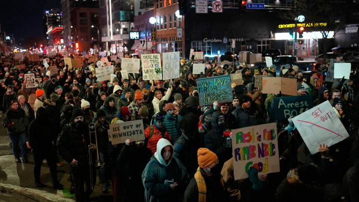 Anti-ICE protesters storm Minneapolis hotel and set off fireworks after shooting