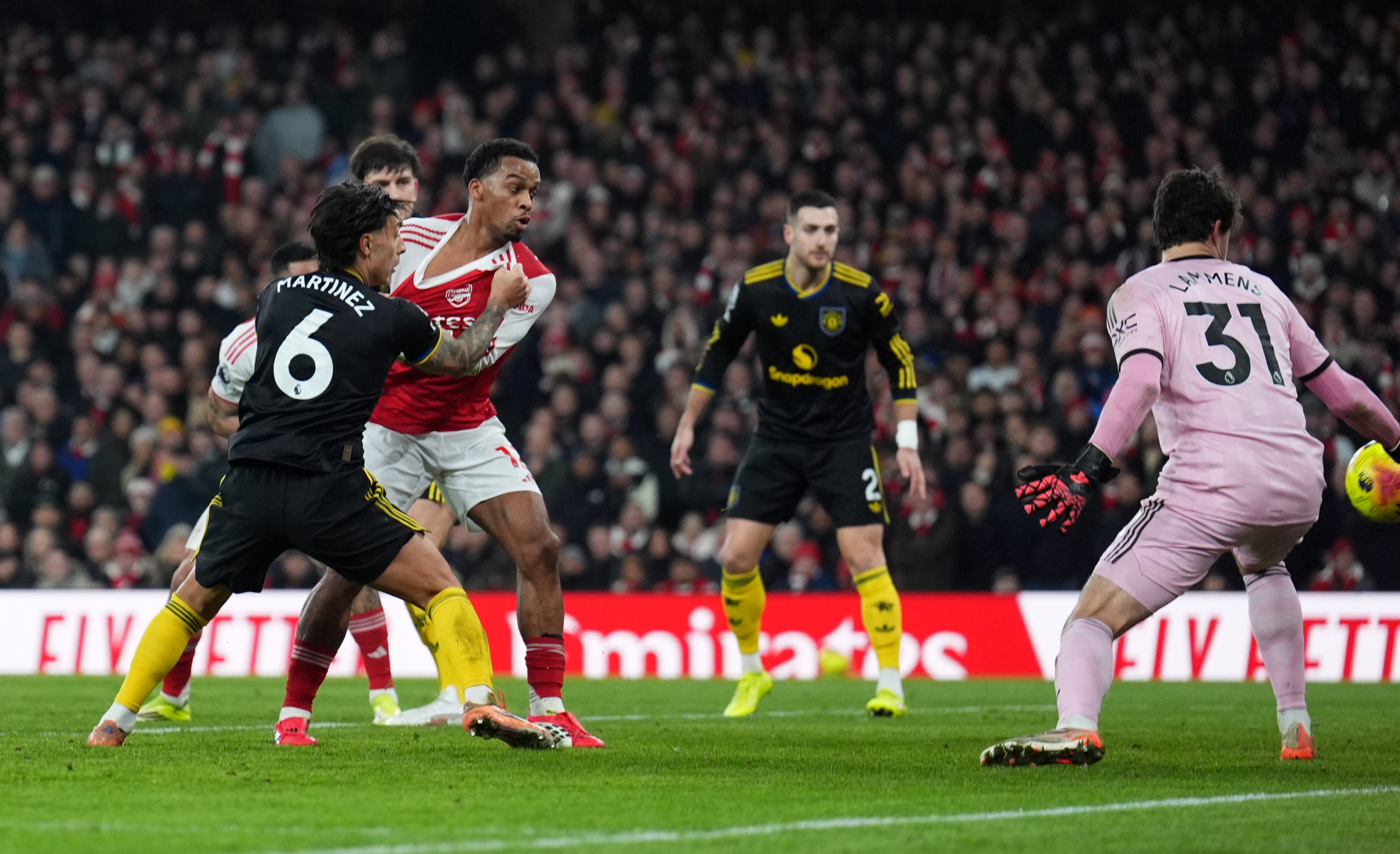 Arsenal's first goal was a deflection off Lisandro Martinez's feet