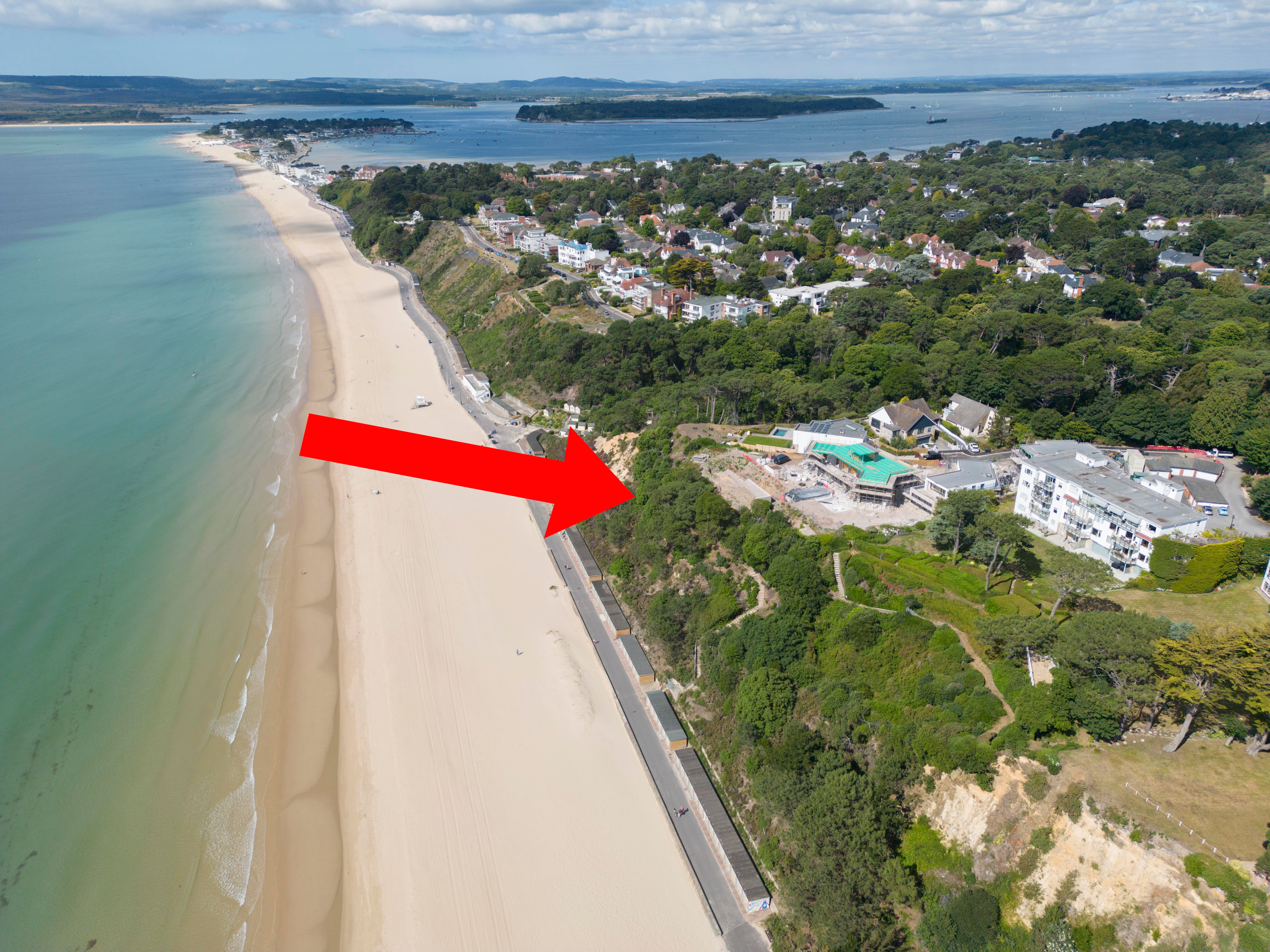 Aerial view of Bill Buckler's clifftop mansion under construction
