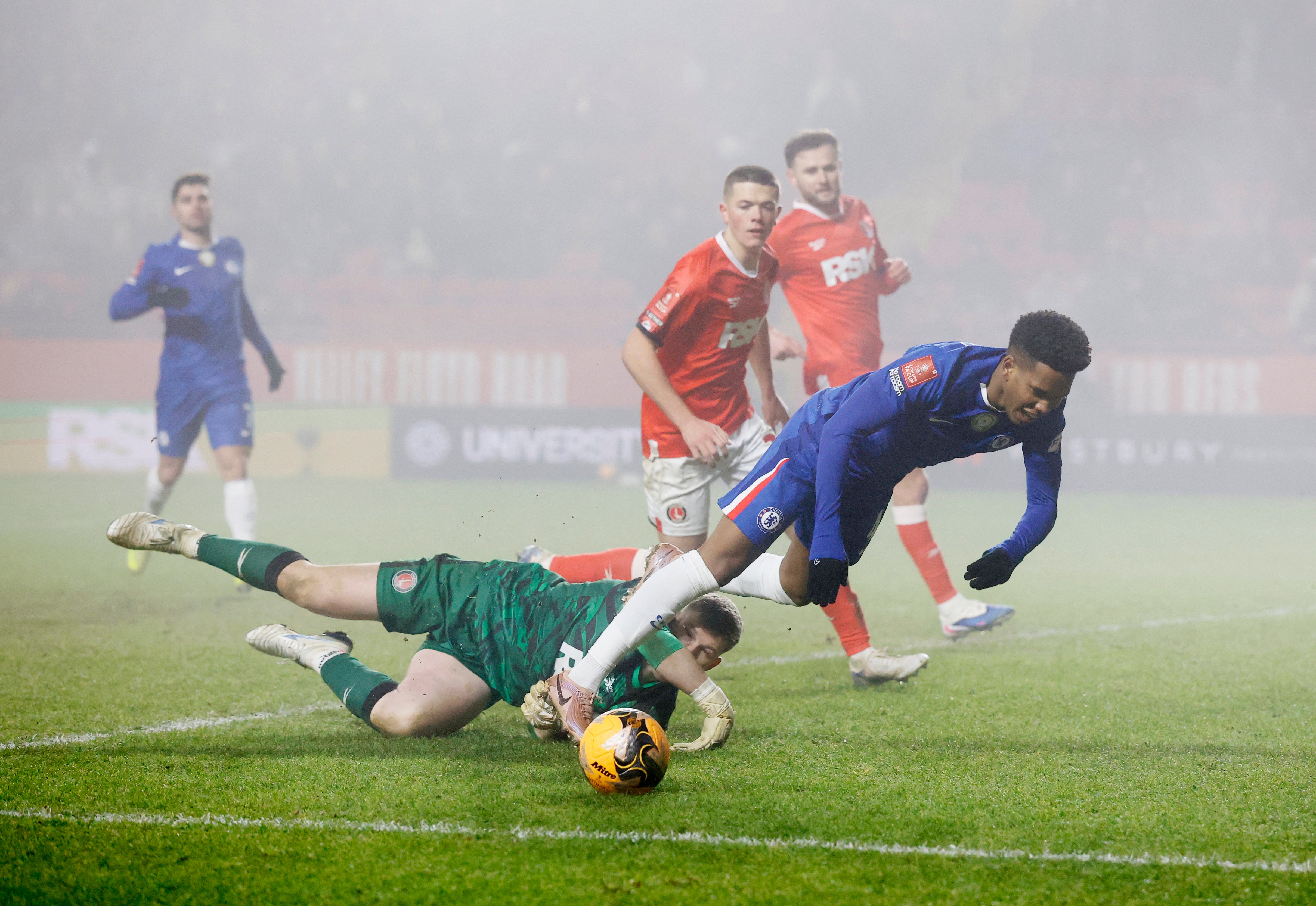 Charlton Athletic's William Mannion concedes a penalty against Chelsea's Estevo