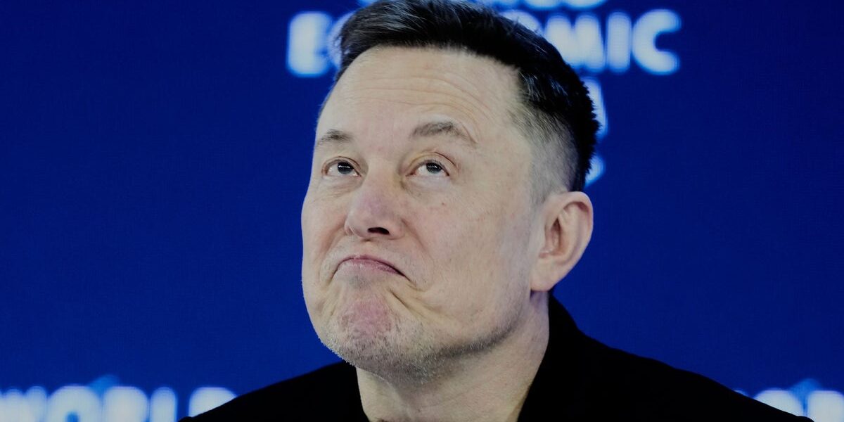 Elon Musk makes surprise Davos appearance in stunning comeback