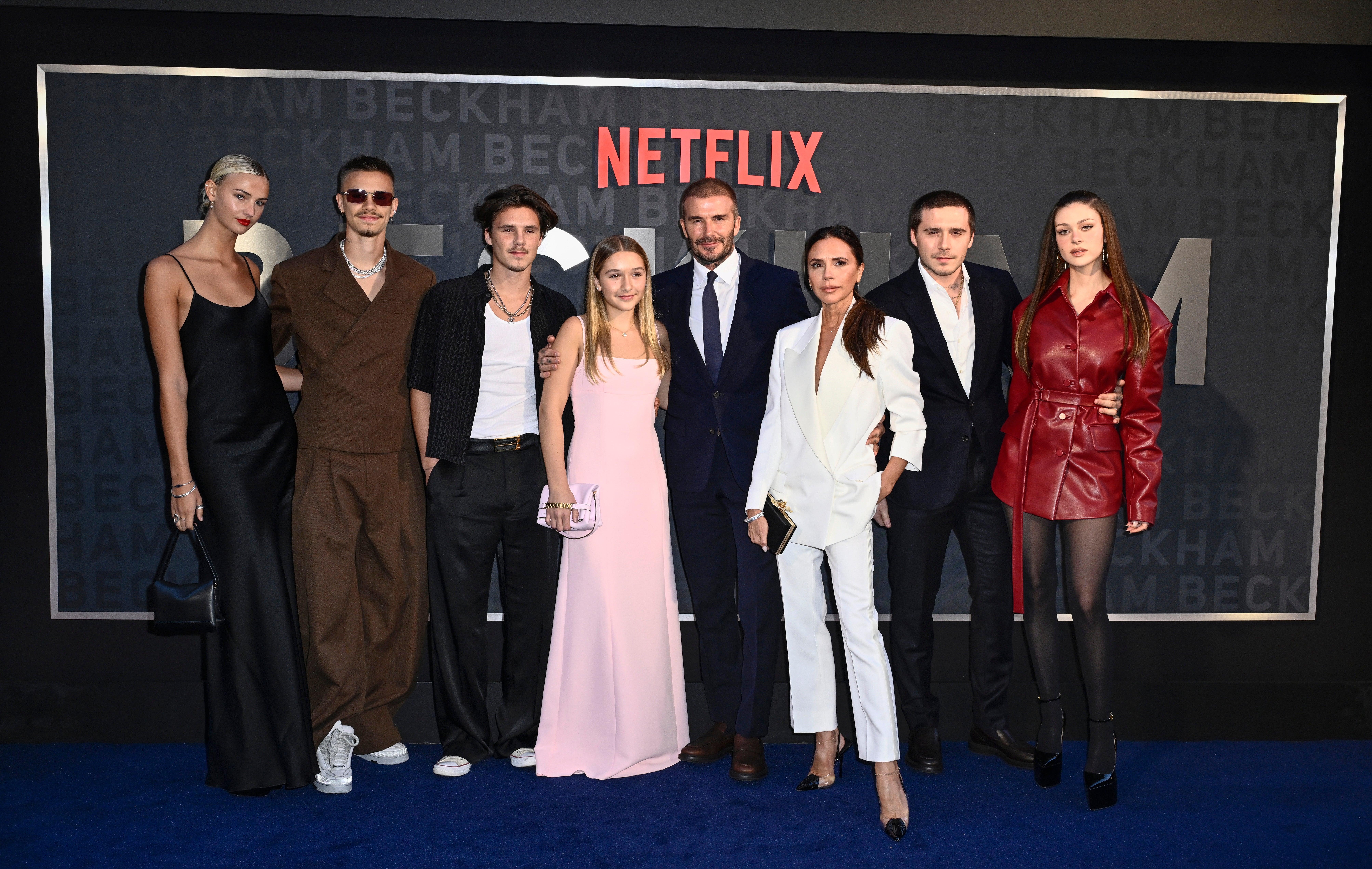 A family poses for a photo at the UK premiere of Netflix's 