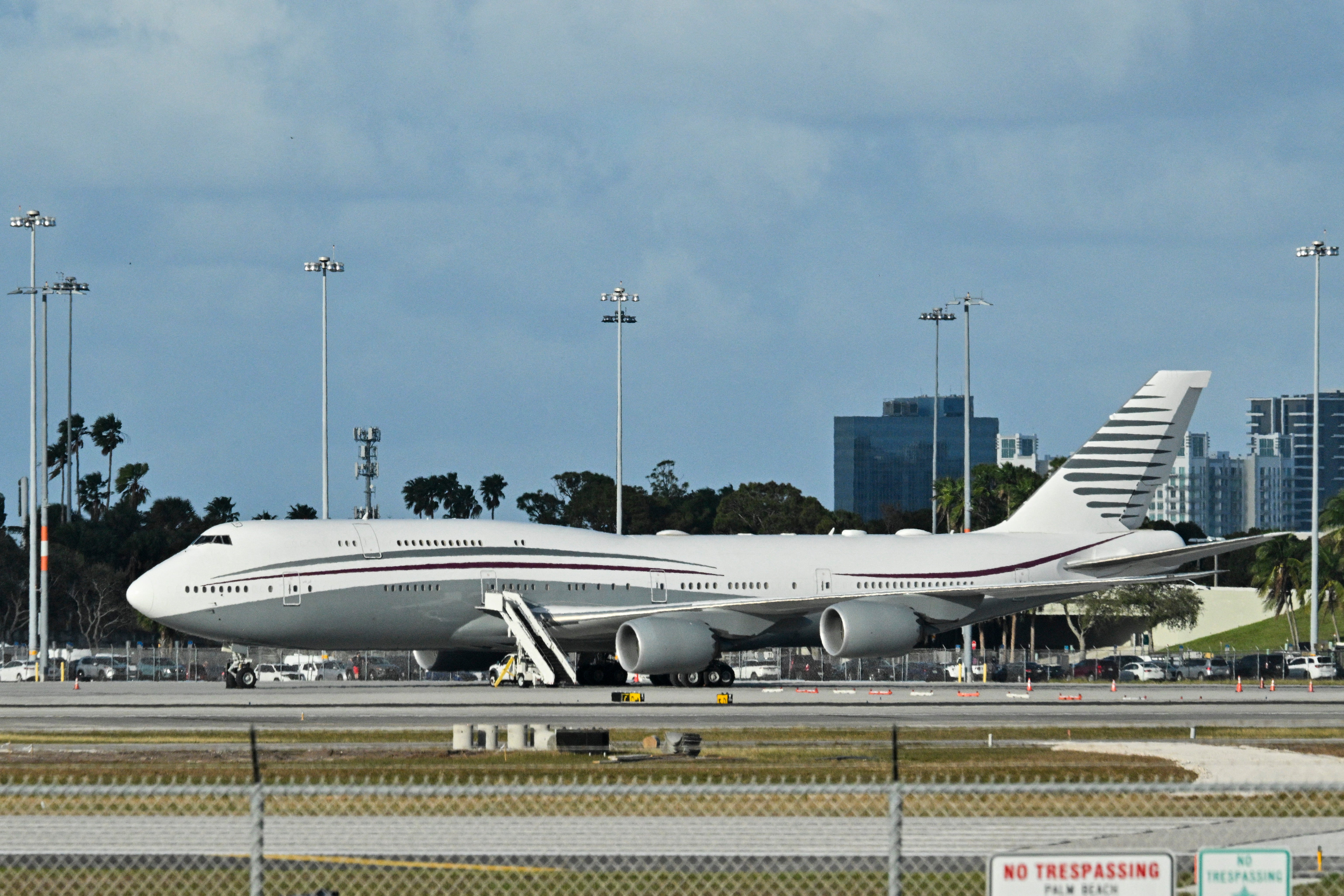 U.S. President Donald Trump parked on the tarmac of Palm Beach International Airport after visiting a Qatari Boeing 747 aircraft on February 15, 2025