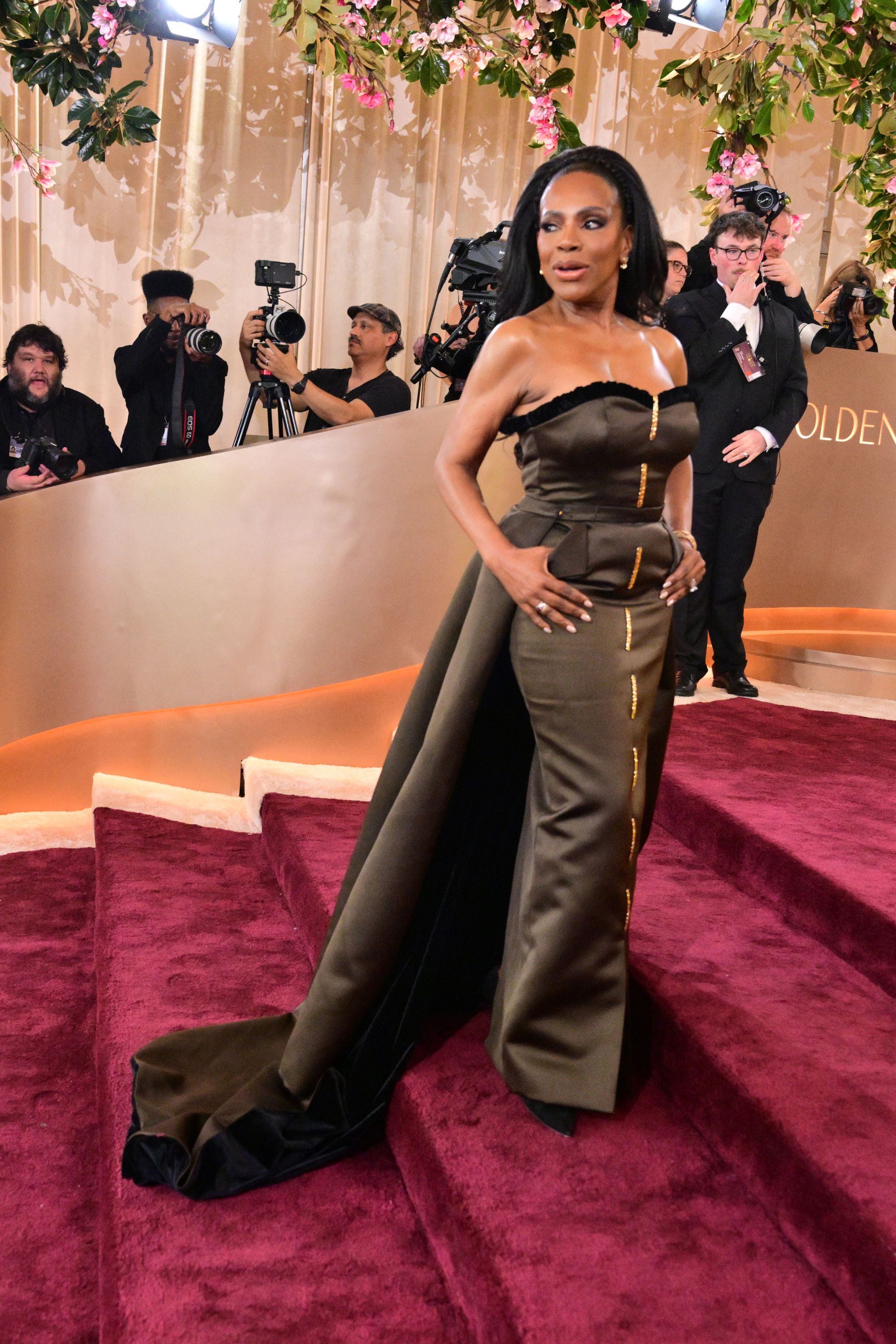 The traces of gold sequins down the middle of Ralph's dress leave a lot to be desired