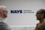 Hayes says job market remains under pressure as it counts on rising hiring in new year