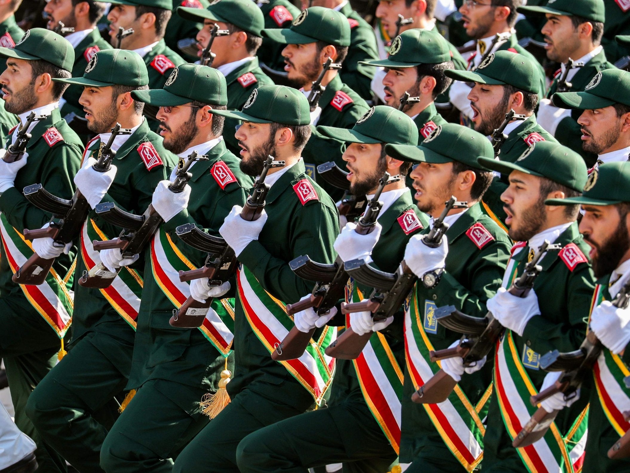 Members of Iran's Revolutionary Guards march during annual military parade