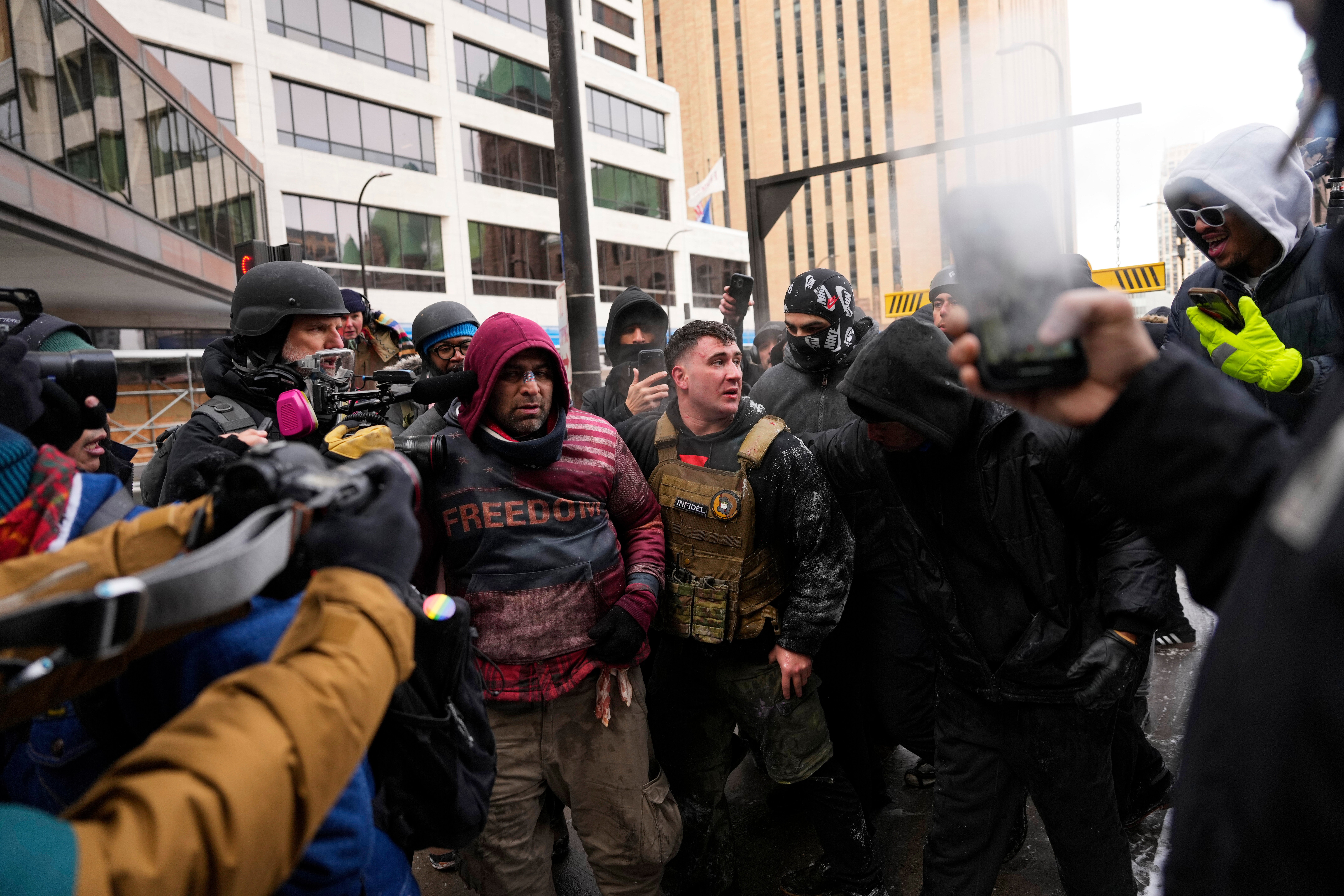 Jan. 6 rioter Jack Long confronts protesters in Minneapolis on Saturday