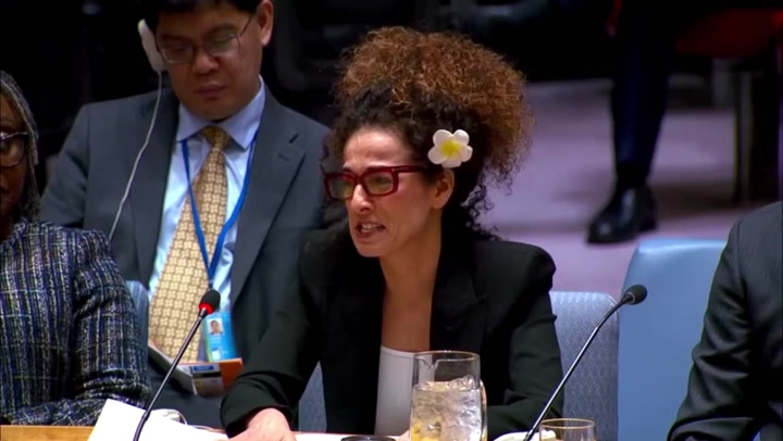 Iranian journalist bursts into tears as he reads names of protest victims