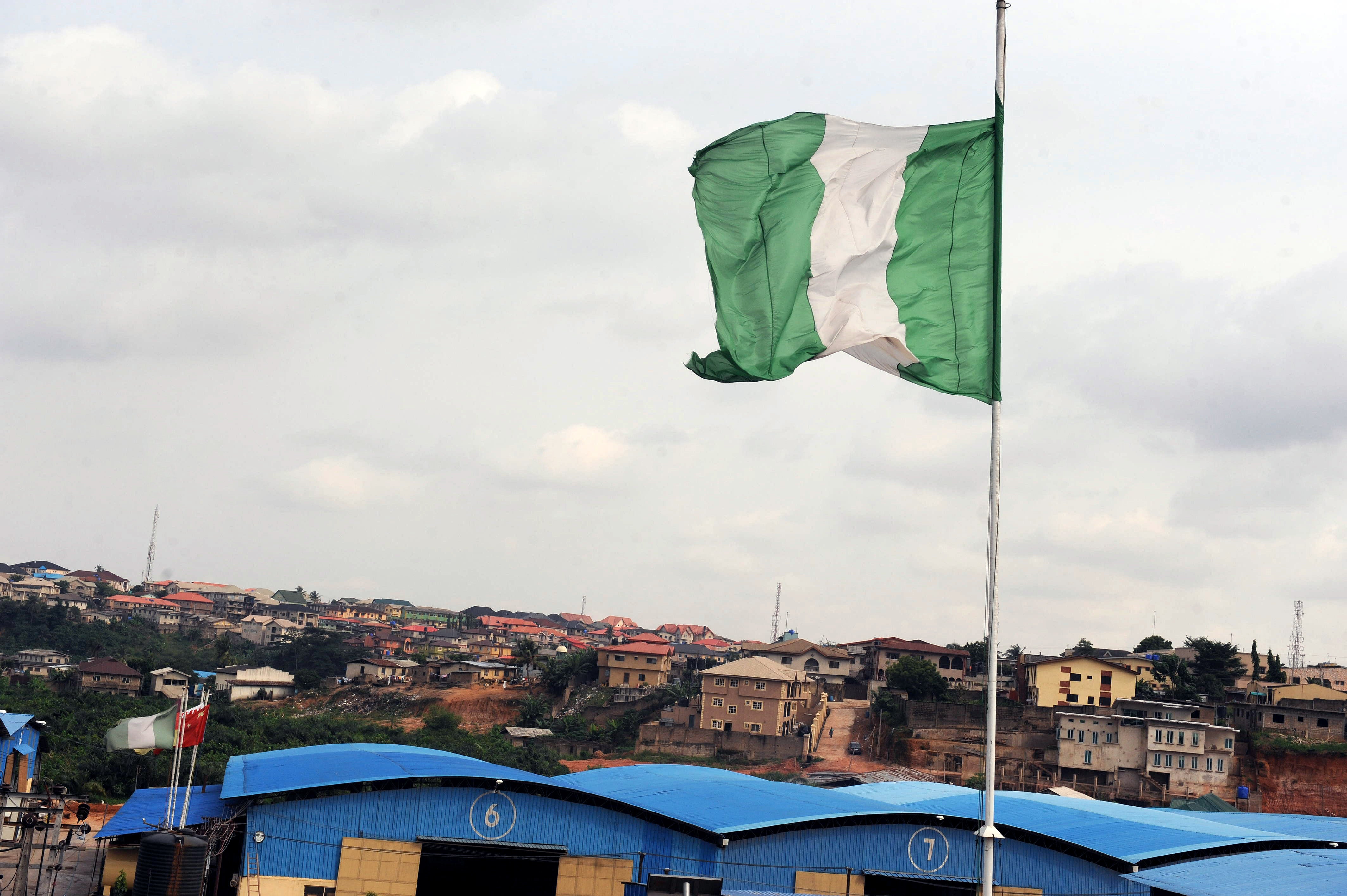 Nigerian flag flying over the factory