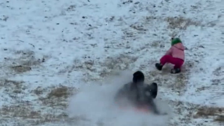 Police take kid away while sledding