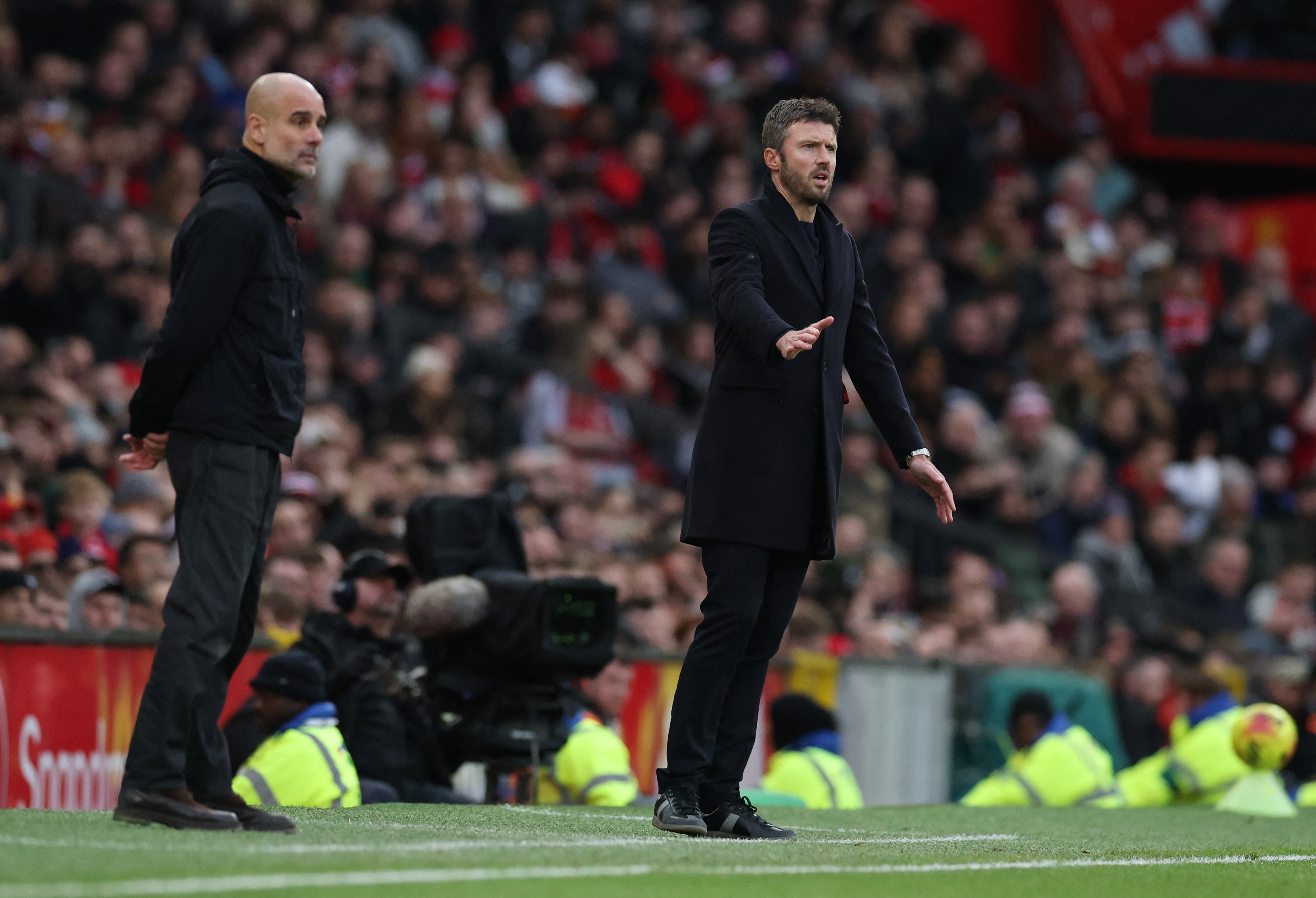 Michael Carrick (right) wins tactical battle against Pep Guardiola