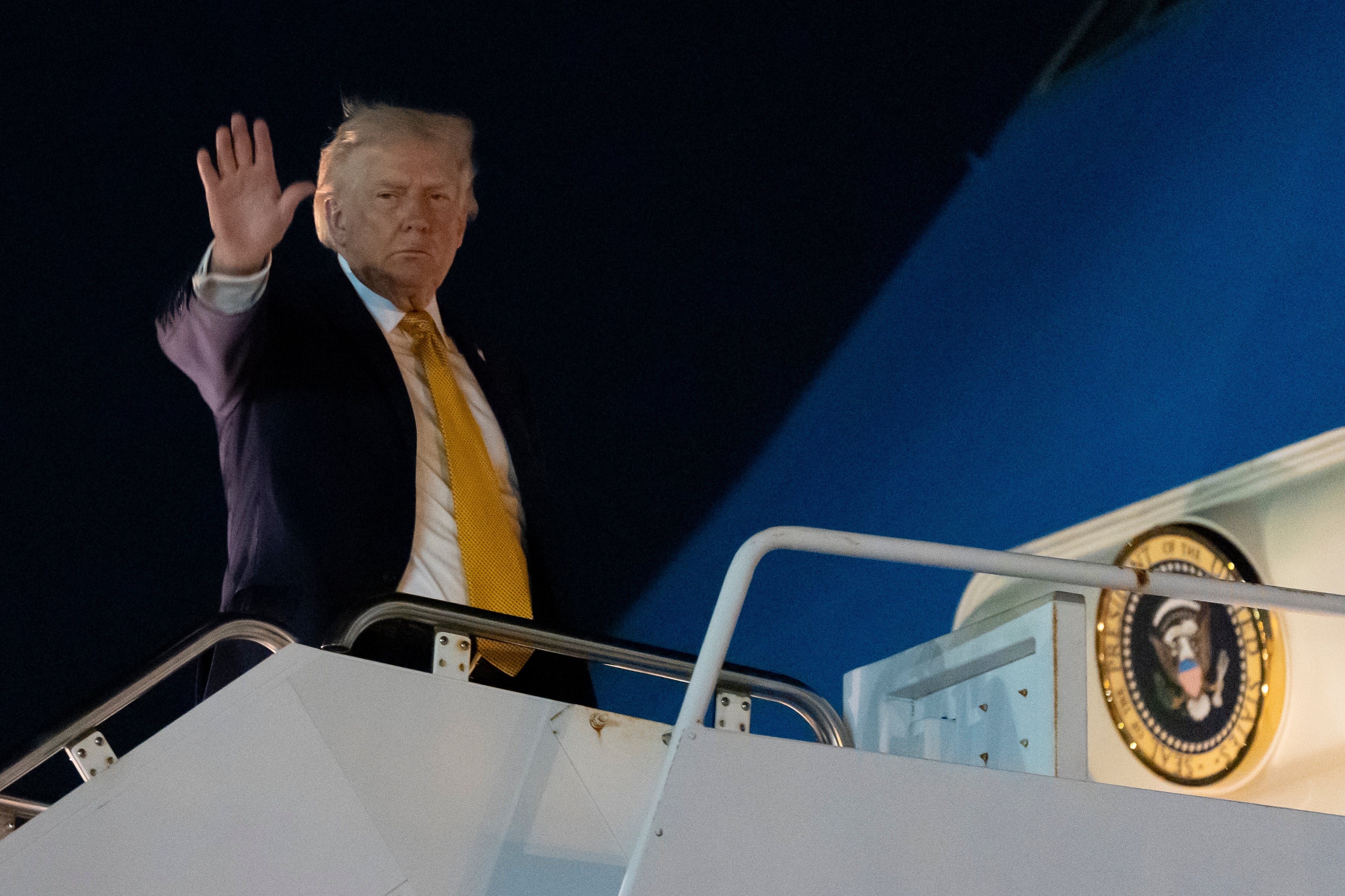 President Donald Trump flies aboard Air Force One from Palm Beach International Airport in West Palm Beach, Florida, Sunday, January 4, 2026