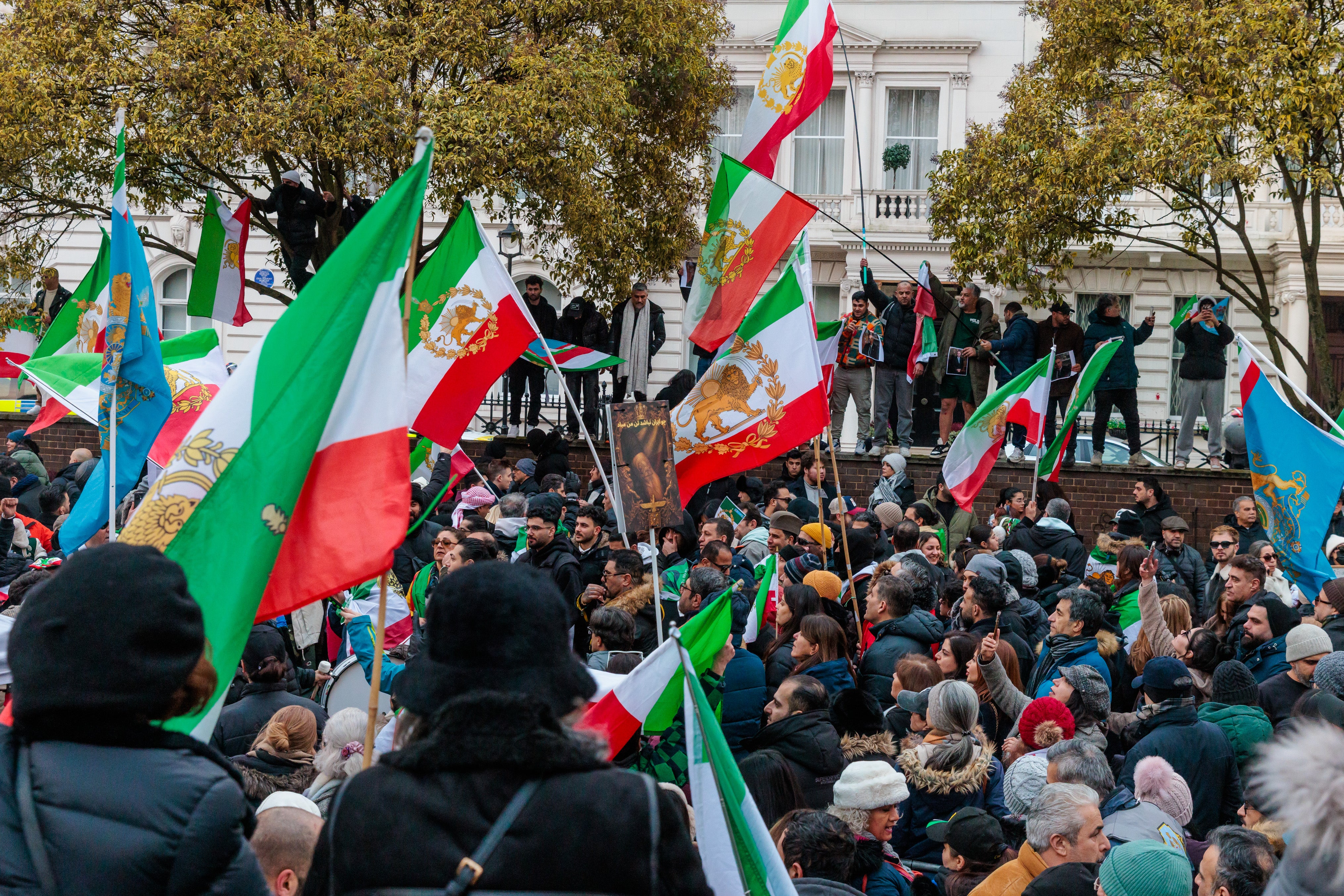 Members of the Iranian community packed the road opposite the Iranian Embassy in London