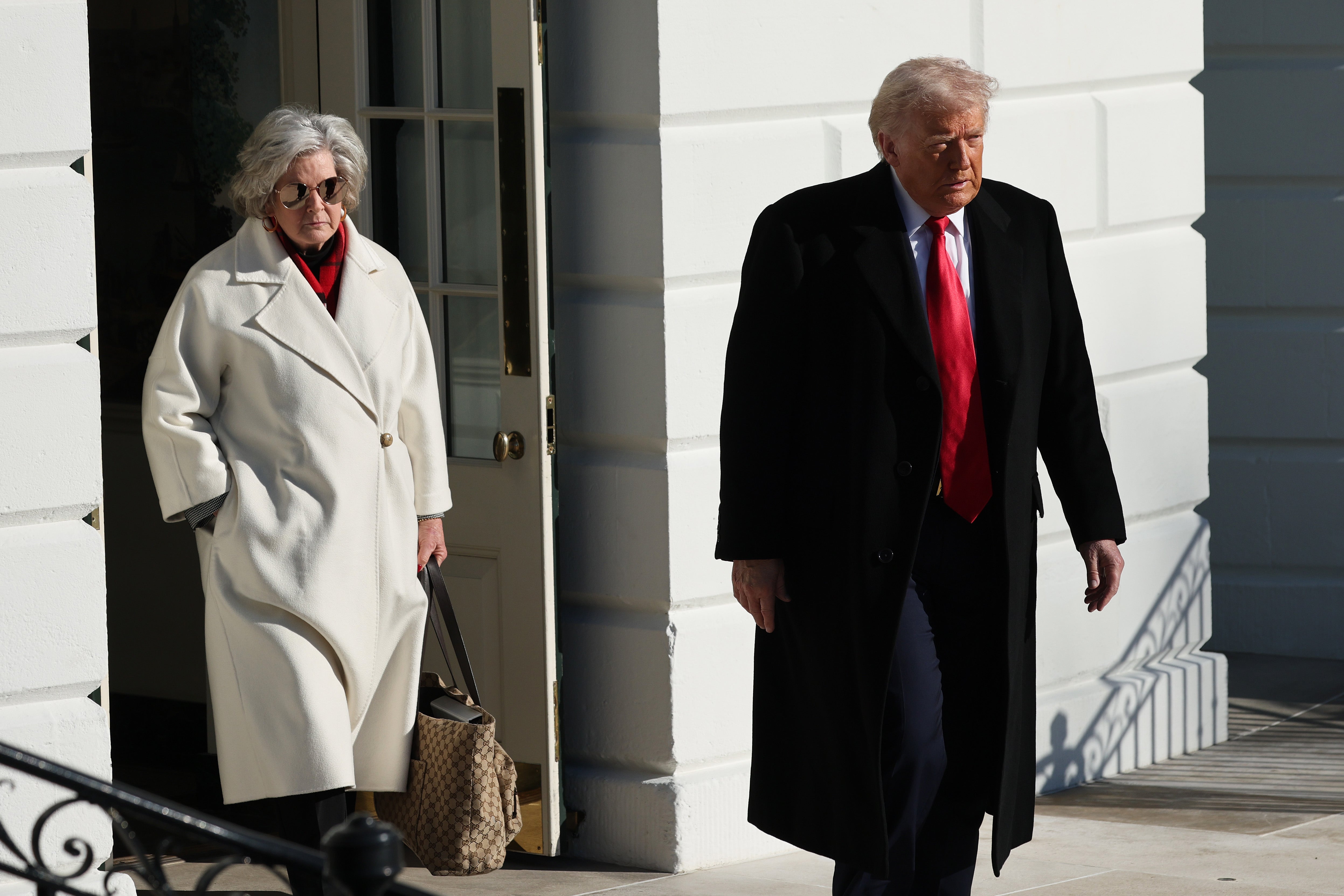 White House Chief of Staff Suzy Wiles and President Donald Trump leave the White House for a day trip to Michigan
