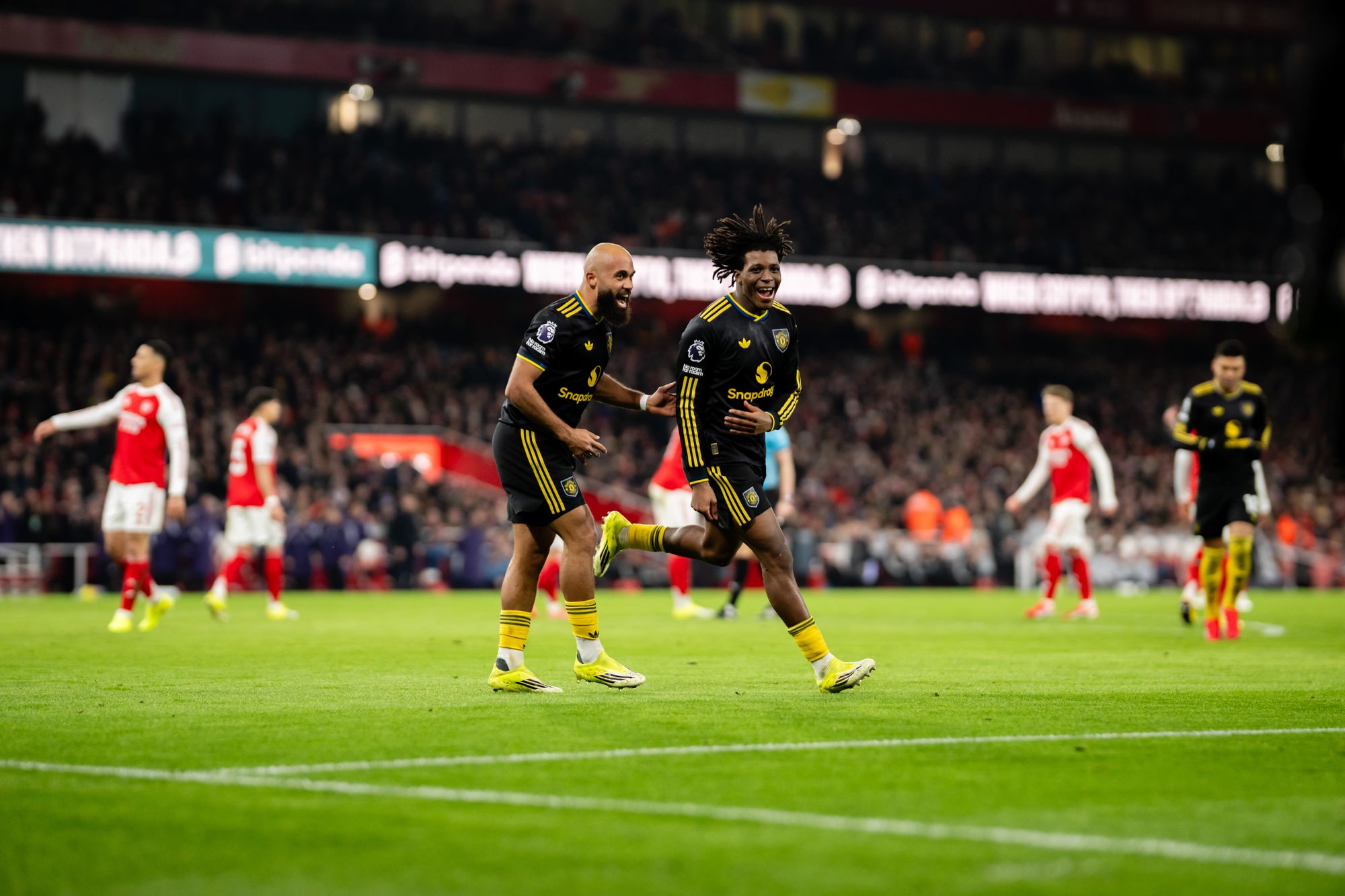 Patrick Dorgu turns around to celebrate after scoring a stunning volley