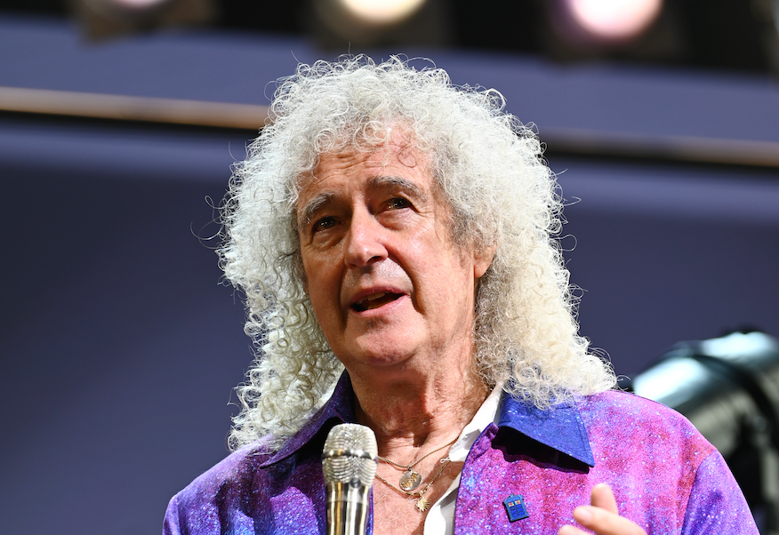 The We Will Rock You star says Queen will never perform at Glastonbury unless 