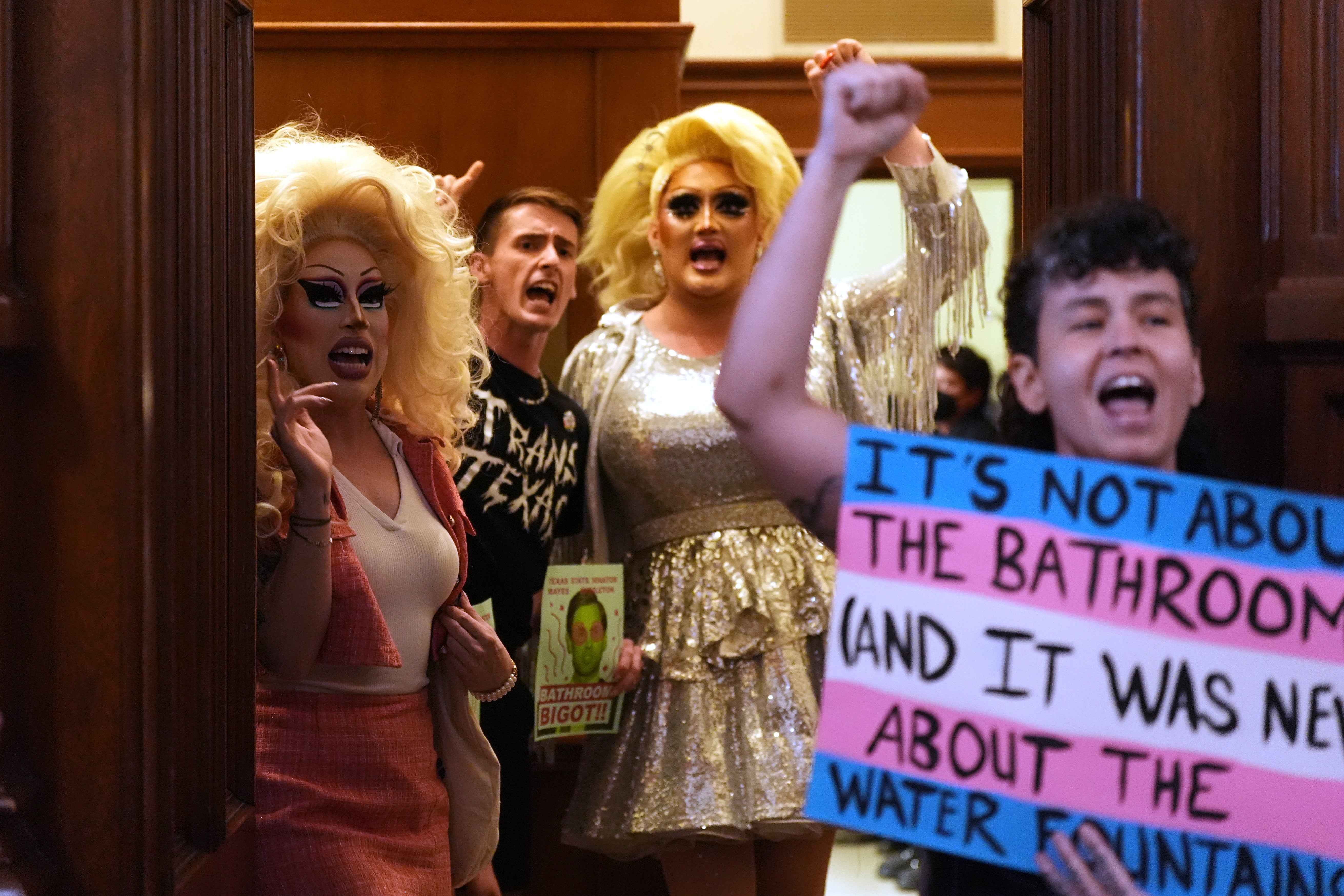 Protesters occupy the women's restrooms to protest an anti-transgender bathroom bill at the Texas State Capitol on Friday, August 22, 2025, in Austin, Texas. (AP Photo/Eric Gay)