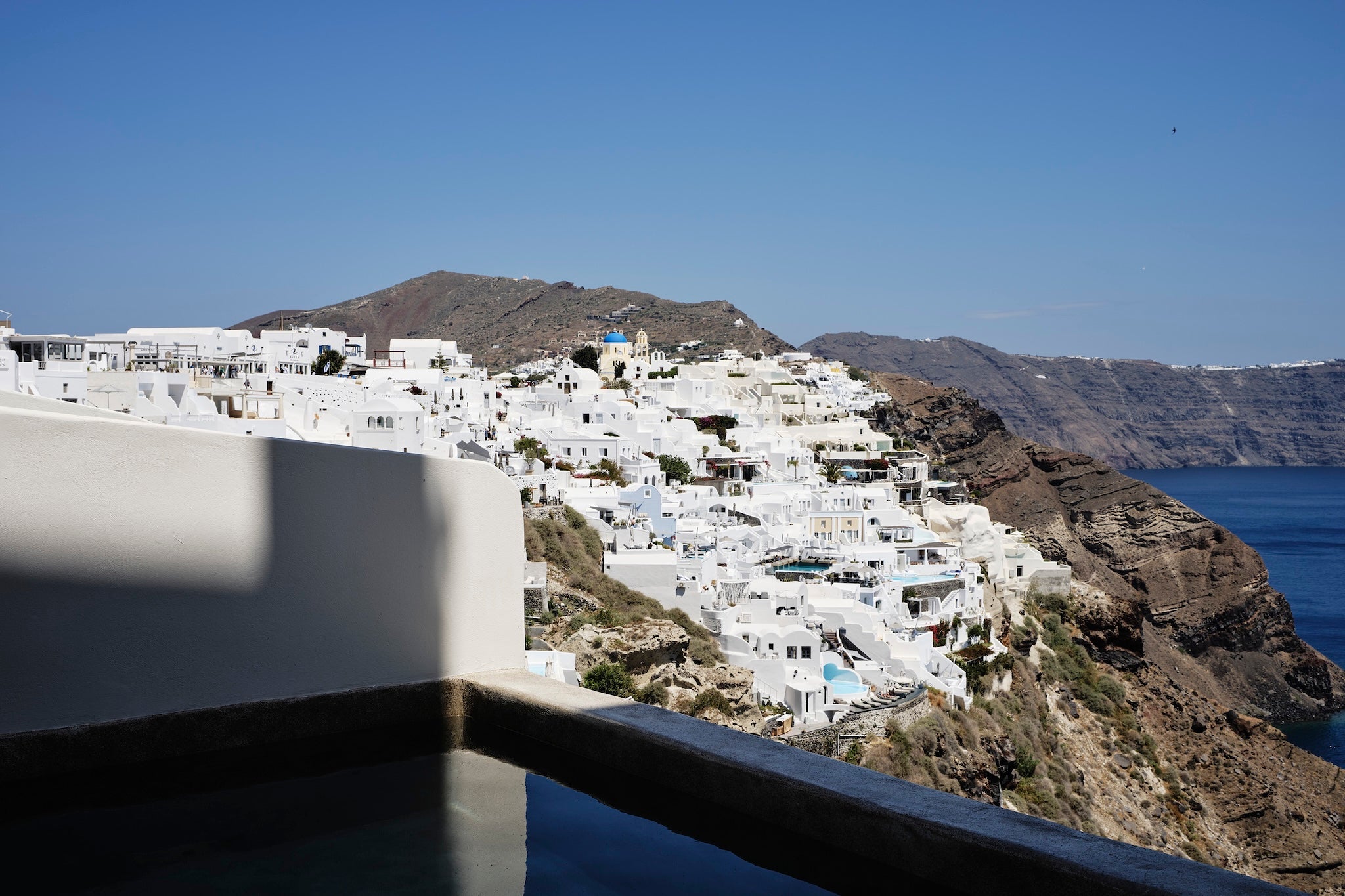 The hotel offers sweeping views of Oia