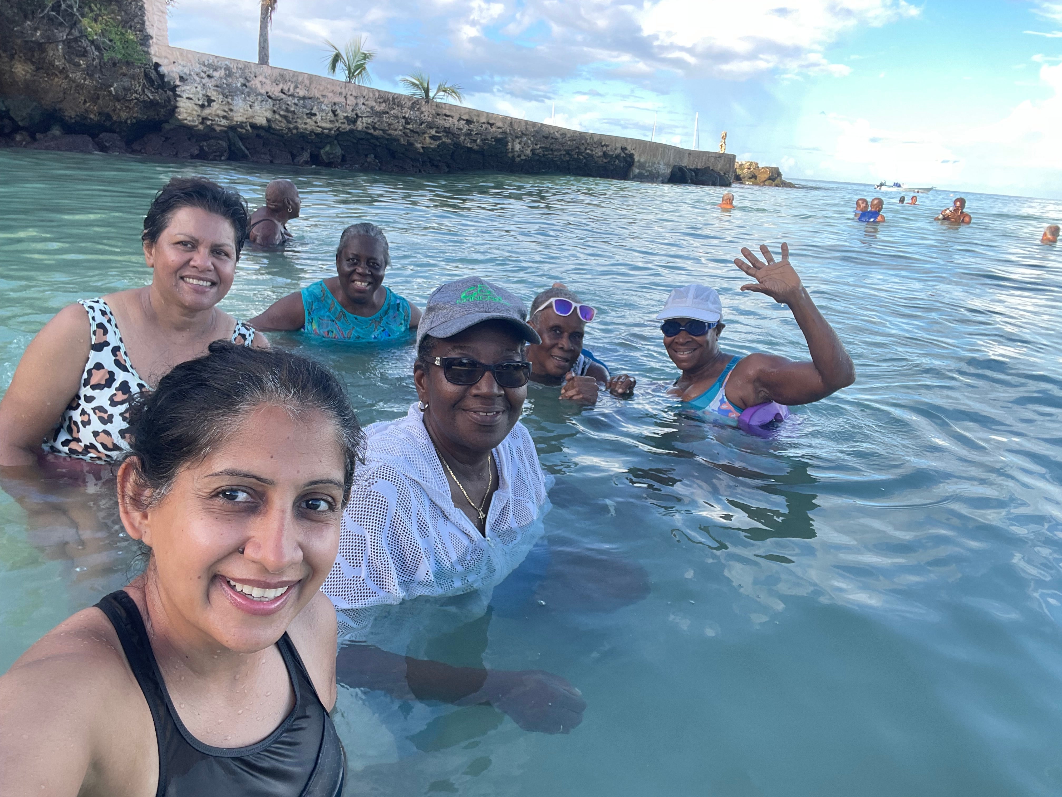 Minlit swims with people she meets on her journey